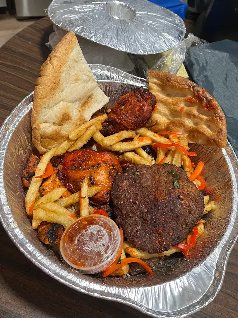 Qabeli Pallaw with lamb shank at Afghan Chopan Kebab Edmonton